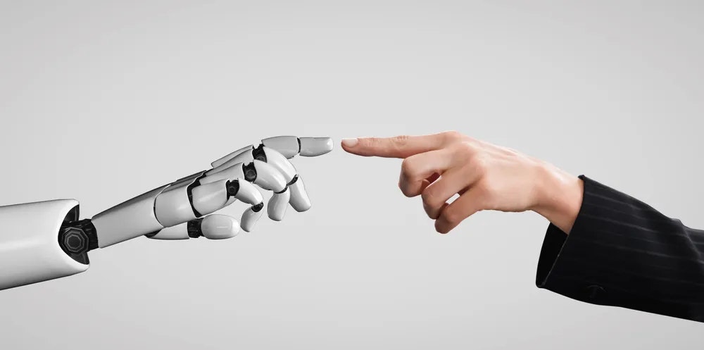 robot and human finger touching